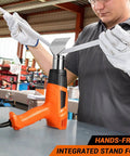 Person using Powerful 1500W Dual Temperature Heat Gun With 350C And 550C Settings For Quick Drying Shrinking Vinyl