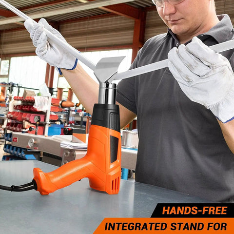 Person using Powerful 1500W Dual Temperature Heat Gun With 350C And 550C Settings For Quick Drying Shrinking Vinyl