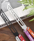 Integrated Forging Bushing System With Aluminum Channel Handle showing ergonomic grip with colorful handles on a wood surface