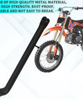 Stainless Steel Dirt Bike Stand With Spring, Motorcycle Side Kickstand For Dirt Pit Bikes, shown next to a dirt bike.