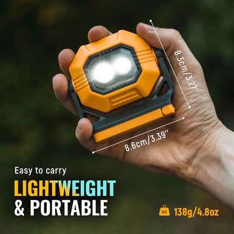 Hand holding a Two Pack 1500 Lumen Rechargeable Work Light With Magnetic Base And 360 Degree Rotating Head IPX4 Waterproof 3 Modes