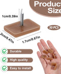 Thirty Piece Tack In Drawer Glides 17X12Mm Heavy Duty Plastic With Iron Pins Nail On Slides shown with size indicators and held in hand.