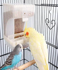 Two Piece No Mess Automatic Bird Feeder For Pet Cages with a yellow cockatiel and blue budgie in a cage.