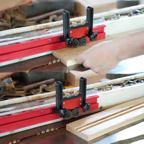 Dad Approved Adjustable Aluminum Featherboard With Tough Polyurethane Grip Wheels For Table Saw And Band Saw Woodworking Safety Setup in use on a woodworking table.