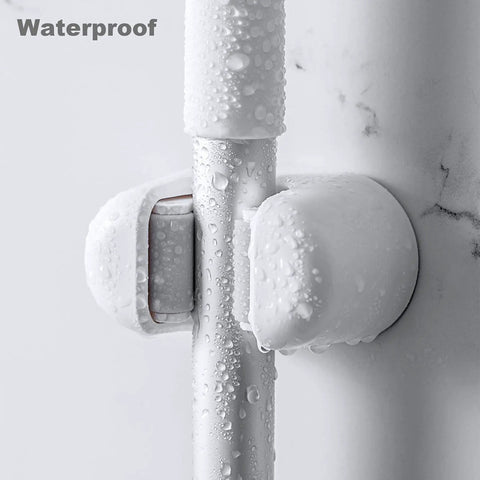 Close-up of a waterproof Three Pack Wall Mount Mop And Broom Holder Organizer with Self Adhesive Clips, ABS plastic, non-slip grip.