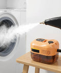 Heavy Duty 2500W Handheld Steam Cleaner With 4.5 Bar High Pressure for Kitchens and Bathrooms in use, steaming from nozzle.