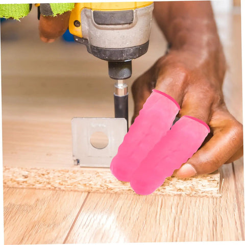 No Sweat Finger Shields Durable Anti Static Pink Latex Covers For Joint Relief And Cracked Skin Repair while drilling into wood.