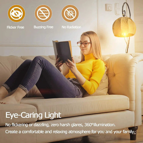 Woman reading under dimmable 6W tubular LED bulb 60W equivalent, 2700K warm white, 600 lumens, frosted finish lamp on sofa