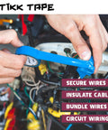 Person using Heavy-Duty Multicolor Electrical Tape 3/4-Inch By 22 Yards Workhorse For Contractors on circuit wiring