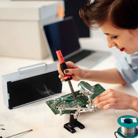 Person using Solder Smoke Absorber Fume Extractor For DIY Soldering And 3D Printing, 60W High Suction Soldering Fan with Activated Carbon Filter