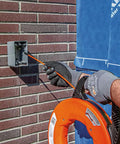 Non Conductive Electrical Fish Tape With Multi Groove Fiberglass Wire Puller Nylon Tip And Pro Grade Housing In Use Outdoors