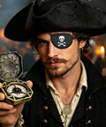 Top Shelf Black Renaissance Pirate Tricorn Hat Set With Distressed Faux Leather Finish Including Realistic Eye Mask Chain Necklace And Antique Style Brass Compass, man wearing pirate costume.