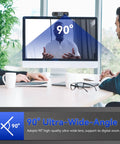 Premium 2K Webcam With Built In Speaker And Noise Canceling Mic, Straight Up Crisp Video For PC, Zoom, Teams And Streaming, Privacy Shutter, Rapid Autofocus And Low Light Setup with 90° ultra-wide angle lens in office setting.