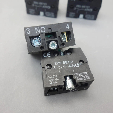 Close-up of Ten Pack Snap In Momentary Push Button Switch Contact Block with Screw Clamp Terminals, showcasing connection points.