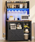 35.4 Inch Coffee Bar Cabinet With Power Outlet And Storage, Boss Level Farmhouse Microwave Stand With Hutch, LED Lights, Wine Glass Holder And 8 Hooks, Black Kitchen Organizer For Countertop And Pantry set in a kitchen scene.