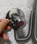 Pack Of Twelve Split Flange Escutcheon Plates With Sharp Chrome Finish Delivers Quick Setup To Hide Unruly Pipe Runs And Pex Hookups Effortlessly Fits Half Inch Iron And Three Quarter Copper Lines Flawlessly, showing chrome escutcheon around pipe fitting.