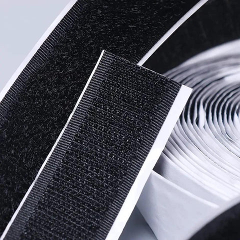 Close-up of Heavy Duty Hook And Loop Tape Roll 16.4 Ft By 2 Inch Wide with adhesive backing for home organization.