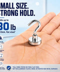 Boss Grade Magnetic Hooks 10 Pack Silver 30lb Grip Cruise Ship Essentials Refrigerator Wall Mount Organizer Clips No Drilling Needed For Easy Travel Hack Or Home Organization Setup in hand showing strong hold.