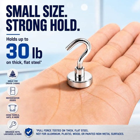 Boss Grade Magnetic Hooks 10 Pack Silver 30lb Grip Cruise Ship Essentials Refrigerator Wall Mount Organizer Clips No Drilling Needed For Easy Travel Hack Or Home Organization Setup in hand showing strong hold.