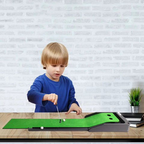 Child using Indoor Mini Golf Mat With Auto Return System For Home And Backyard Practice Portable Compact Golf Training Surface