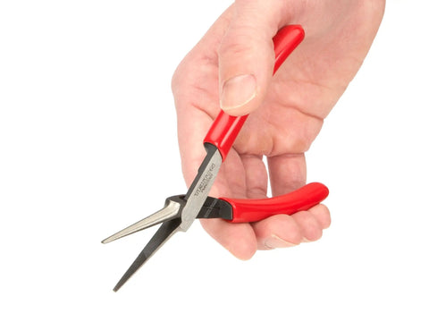 Hand holding pocket sized mini needle nose pliers with serrated jaw, long tapered nose, and wide flat non-slip handles for precision grips.