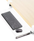 Large Under Desk Keyboard And Mouse Tray With Smooth Slider Rail System, Heavy Duty Quick Grip Clamp For Ergonomic Typing Comfort in use below a desk.