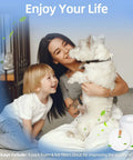 Woman and child playing with dog, inset showing 4 Pack 3.7 Inch High Replacement Base Pre-Motor Foam Filters For Shark IQ Robot Vacuum R101AE RV1001AE UR1005AE Self-Empty Base Easy Install And Durable Filtration Kit To Boost Suction Prolong Motor Life And Keep Floors Clean