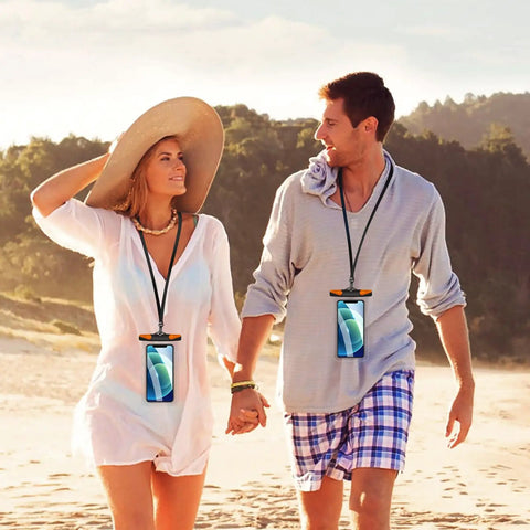 Couple walking on beach with Waterproof Phone Pouch With Lanyard For iPhone And Android IPX8 Phone Case Dry Bag 30M
