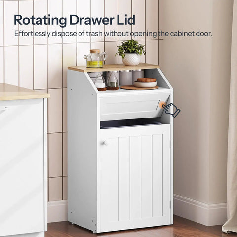 Hidden 10 Gallon Trash Cabinet With Flip Door Freestanding Wood Recycling Bin For Kitchen And Living Room White Finish No Fuss Pet Proof Latching Door Keeps Odors Quiet And Clutter Out Of Sight, showing closed white cabinet in corner with flip lid.
