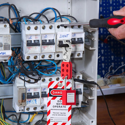 No Fuss Lockout Tagout Station And Group Safety Kit Featuring Osha Compliant Pads Hasps Tags And Hooks Job Site Ready Hanging Board with lockout tag in electrical panel.