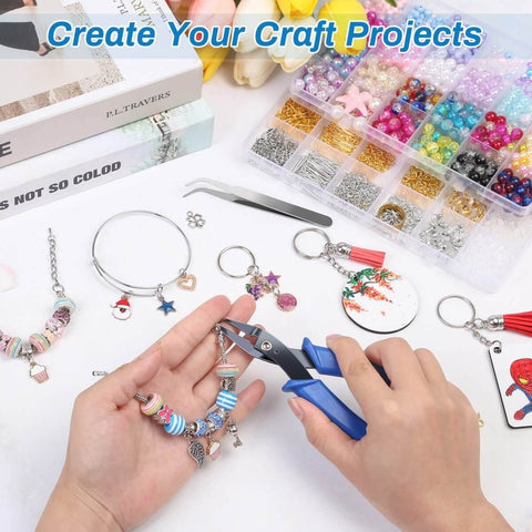 Person using Split Ring Opener Tool For Jewelry Making, Keychain Pliers Set with jump rings, charms, and beads visible.