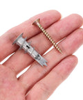 Hand holding heavy duty drywall anchors and screws kit for a rock solid fix in offices and commercial spaces self drilling hollow wall anchors zinc alloy and iron 20 sets great for hanging bathrooms and kitchens and more