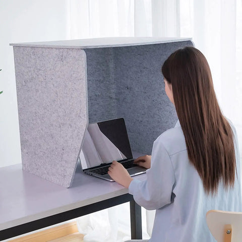 Person using a Portable Soundproof Booth With Acoustic Foam Panels for Hella Crisp Audio and Tight Room Acoustics.
