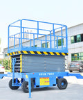 Heavy Duty Electric Scissor Lift Platform Featuring Smooth Hydraulic Action For Mobile Warehouse Cargo Hoisting And Adjustable Height side view with safety railing