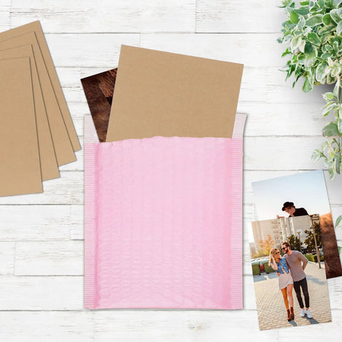 50 Pack 8.5X11 Corrugated Cardboard Sheets Flat Cardboard Inserts for Shipping Packing and DIY Crafts on wooden table.