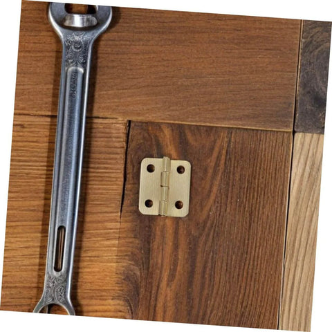 40 Pcs Miniature Brass Hinges With Screws For Jewelry Boxes And Dollhouses 270 Degree Tiny Hinge Hardware on wooden surface