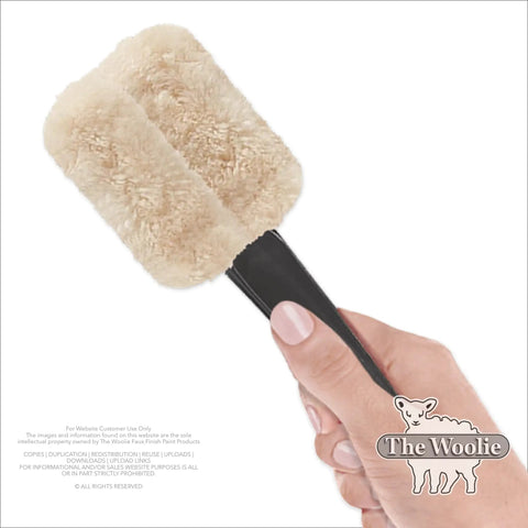 Hand holding Faux Painting Starter Toolkit For Beginners Full Sized 9.75 By 5 Inch Set With Three Quarters Inch Nap Sheepskin Tools USA Made