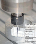 SpeTool 2-flute square-nose carbide end mill, TiAlN coating, 1/8 in shank installed in chuck (close-up)