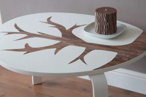Table with tree design using Rustic Wood Self-Adhesive Film Peel-And-Stick Wrap for walls, cabinets, and furniture.