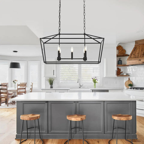 Farmhouse Five Light Candle Pendant Chandelier In Matte Black For Dining Room Foyer Or Porch hanging over kitchen island