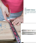 Person installing Drawer Slides 10 Inch Three Section Track Rails Side Mount Silver Set Of 2 for Kitchen and Home Organization.