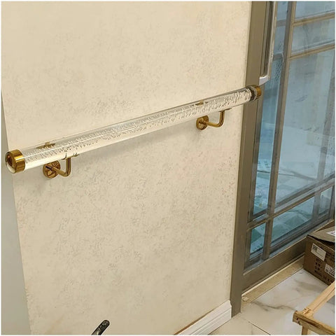 Premium Clear Acrylic Railing Posts With Durable Silver Brackets For Deck And Balcony Guardrails 2 Inch Diameter Tube mounted on wall.