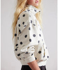 Side view of woman in Polka Dot Half Zip Sweatshirt For Women, Oversized Fleece Pullover With Pockets, Long Sleeve Quarter Zip Casual Hoodie