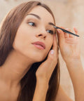 Woman using Two Pack Slant And Point Tip Tweezers Set For Eyebrows And Ingrown Hair Removal, stainless steel, close-up view.