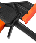 Close-up of Beefy 24 Inch Steel Bar Clamps And Spreaders Two Pack with orange ergonomic trigger.