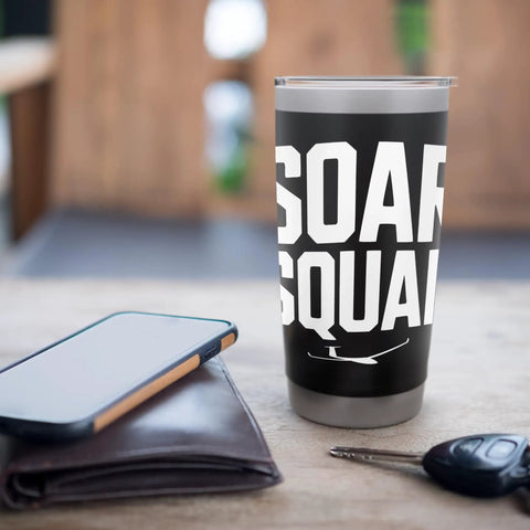 Insulated Stainless Steel Tumbler For Sailplane Crew And Glider Club Fans with Soar Squad text on table with phone and keys