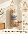Round Hanging Mesh Sock Storage Bag With Nylon Pockets For Closet Door Organization And Dorm Room Essentials Quick Access Laundry Solution To Keep Your Socks Legit Neat And Pretty Dang Slick, hanging with assorted socks inside.