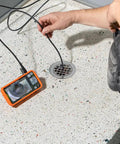 Replacement 5.5 mm 4.9 Foot Armored Waterproof Inspection Snake With LEDs used in plumbing, showing borescope display.