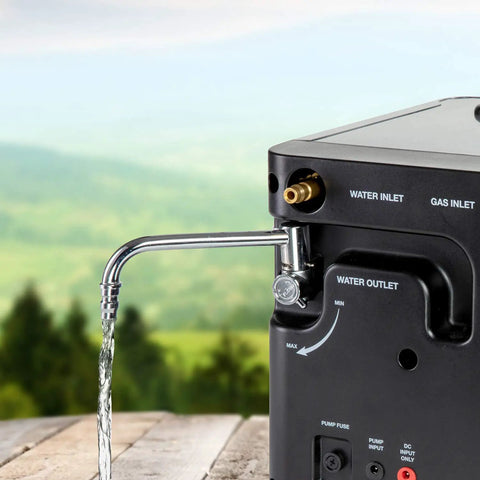 Portable Propane Water Heater And Shower Pump For Camping And Outdoors, side view showing water outlet and flowing water