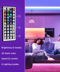 65.6 Foot Ultra Long RGB LED Strip Lights With Remote Control in living room setting, showing remote functions and color lighting options